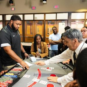 immersion program students at a casino table