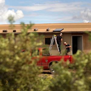 Goal Zero volunteers repairing a home. 