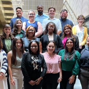 Group from the intern program, standing on stairs