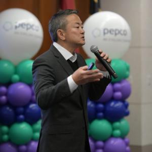 A person talking into a microphone