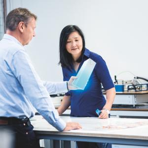 two people standing looking at the Innovation package