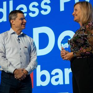 Tim Welsh, Vice Chair, Consumer and Business Banking at U.S. Bank, presenting the award to Dr. Rhonda Switzer, CEO of Interfaith Dental.