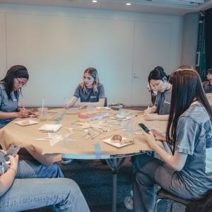 Group of interns seated at table