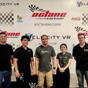 Christopher Reyes pictured with his team at an F1 race.