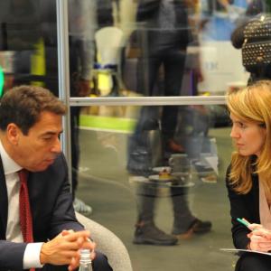 4 people talking in a meeting