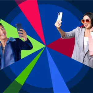 Two people take separate selfies