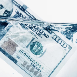 100 dollar bill dipped in water