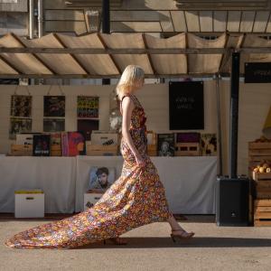 Model wearing one of Stella McCartney's floral dress creations in the Sustainable Market.