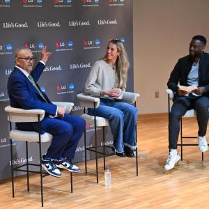 Johnny Milabu of LG Electronics, right, moderates a discussion about mental health with Daniel Gillison, CEO of the National Alliance on Mental Illness (NAMI), left, and WNBA player Lexie Hull Friday, April 3, 2026, in Indianapolis, Indiana.