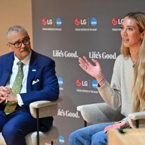 Daniel Gillison, CEO of the National Alliance on Mental Illness (NAMI), left, and WNBA player Lexie Hull, right, participate in a discussion on maintaining good mental health hosted by LG Electronics and NAMI on Friday, April 3, 2026, in Indianapolis, Indiana.