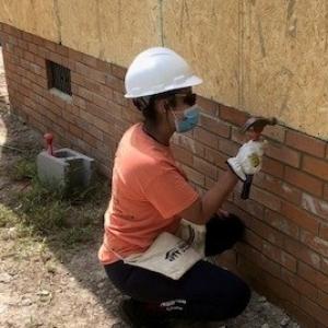 Jazenia working on the house.