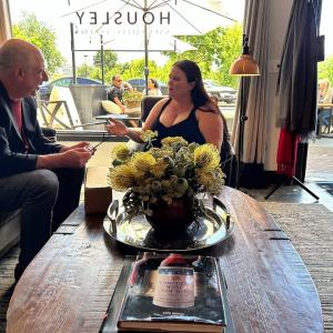 Mark McCaffrey and Jennifer Carson speaking.