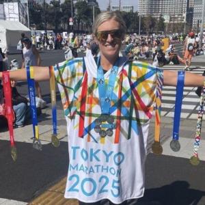 Jessica Gillman with her Six Star Medal and medals from six WMM.