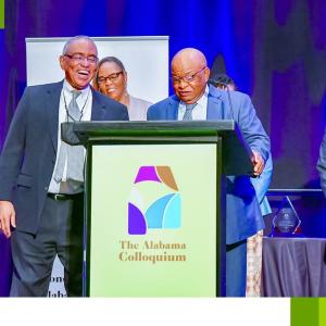 John Lewis' family on stage behind a podium 