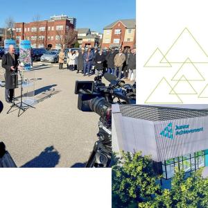 Regions' John Turner giving an interview at the groundbreaking of the McWane Economic Education Center, along with a rendering of the future center. 