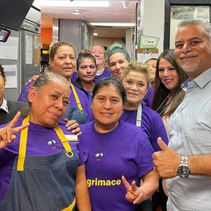 Juan Marquez and McDonalds team in a restaurant.