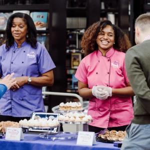 Jera  Stewart in her bakery with her team.