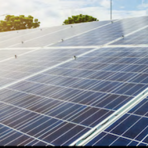 Solar panels against a blue sky.