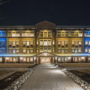  T-Mobile Headquarters in Overland Park, KS lit up in yellow and blue lights