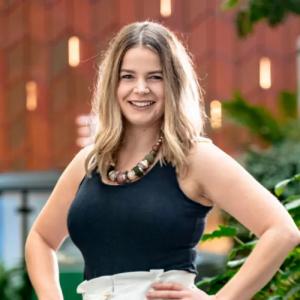 Kate Kirwin posed with hands on hips.