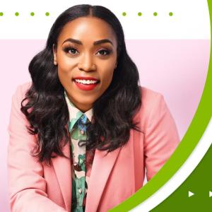 Headshot of a person wearing a pink suit