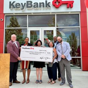 KeyBank team presenting a check to Family Service of Ithaca.