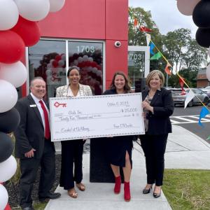 Check presentation to Girls Inc. by KeyBank team.