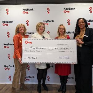 KeyBank presents check to TRIP team for $300,000.