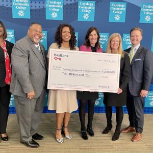 KeyBank and Tri-C Foundation team with grant check.