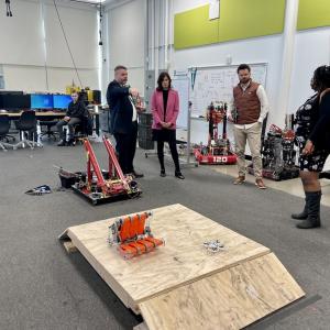 KeyBank and Tri-C team shown in a warehouse.