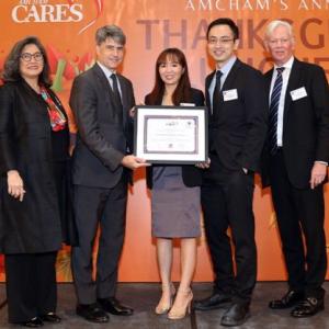  Keysight employees accepting CSR award