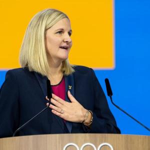 Kirsty Coventry speaking at a lectern