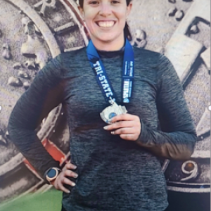 Krystal winning a spartan medal