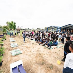 Students joined alongside volunteers to help transform the school's garden into a vibrant learning environment.