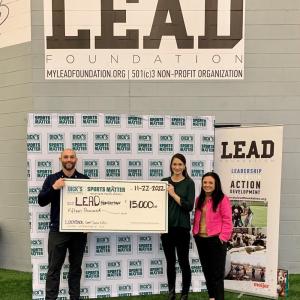 Lead Foundation being presented with a check.