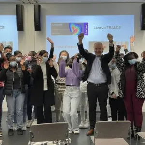 A group of people wearing masks, raising their arms in the air