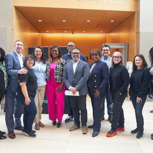 Elected officials along with representatives from GoDaddy, City of Las Vegas, Workforce Connections and Bank of Nevada pose as a group alongside event host Desirae King at the Las Vegas Microbusiness Summit on 2/24/2024. Credit: Kristy Nicholas 