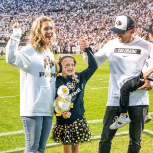 Piper and her family at the Colorado vs. Baylor game.