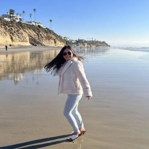 Lea-Angela shown on a beach.