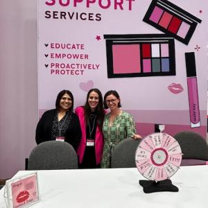 Three people smiling together 