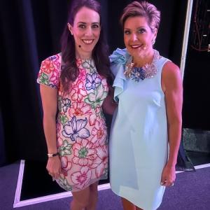 Naisha Covarrubias smiling for a photo with one other person