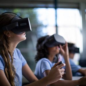 Kids in a classroom wearing VR headsets