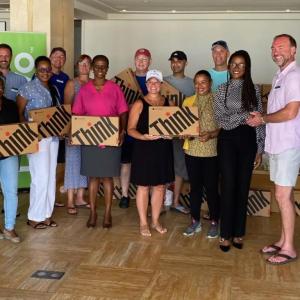 group holding lenovo thinkpad boxes
