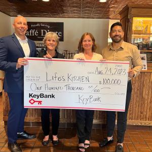 Life's Kitchen Team presented with a $100,000 check from  KeyBank