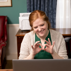 Lindsey Chambers using American Sign Language