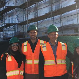 Lisa Gutierrez (right) at the construction site of La Vereda, a modular, affordable senior housing development in San Leandro, California.