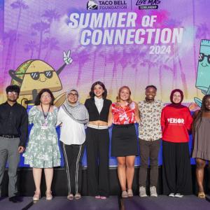 Group of Live Más Scholarship recipients on stage