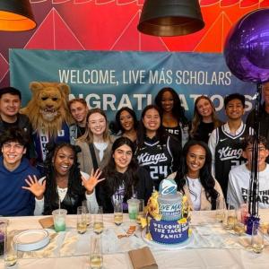 Live Más Scholarship recipients at event