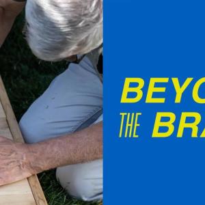 "Beyond the Brand" next to picture of a person's hands using Loctite® to glue a house number onto a wooden board