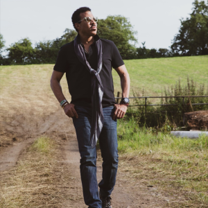 Lionel Richie walking through Hello Park.